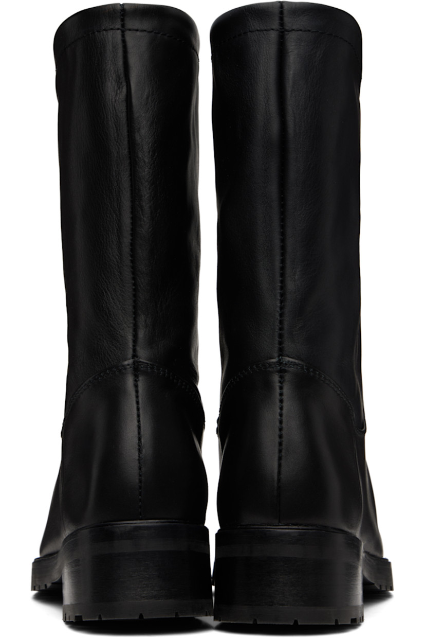 Mid-calf buffed calfskin boots in black.

· Square toe
· Stacked leather block heel and midsole
· Treaded rubber sole
· Heel: H1.75"

Supplier color: Black calf
