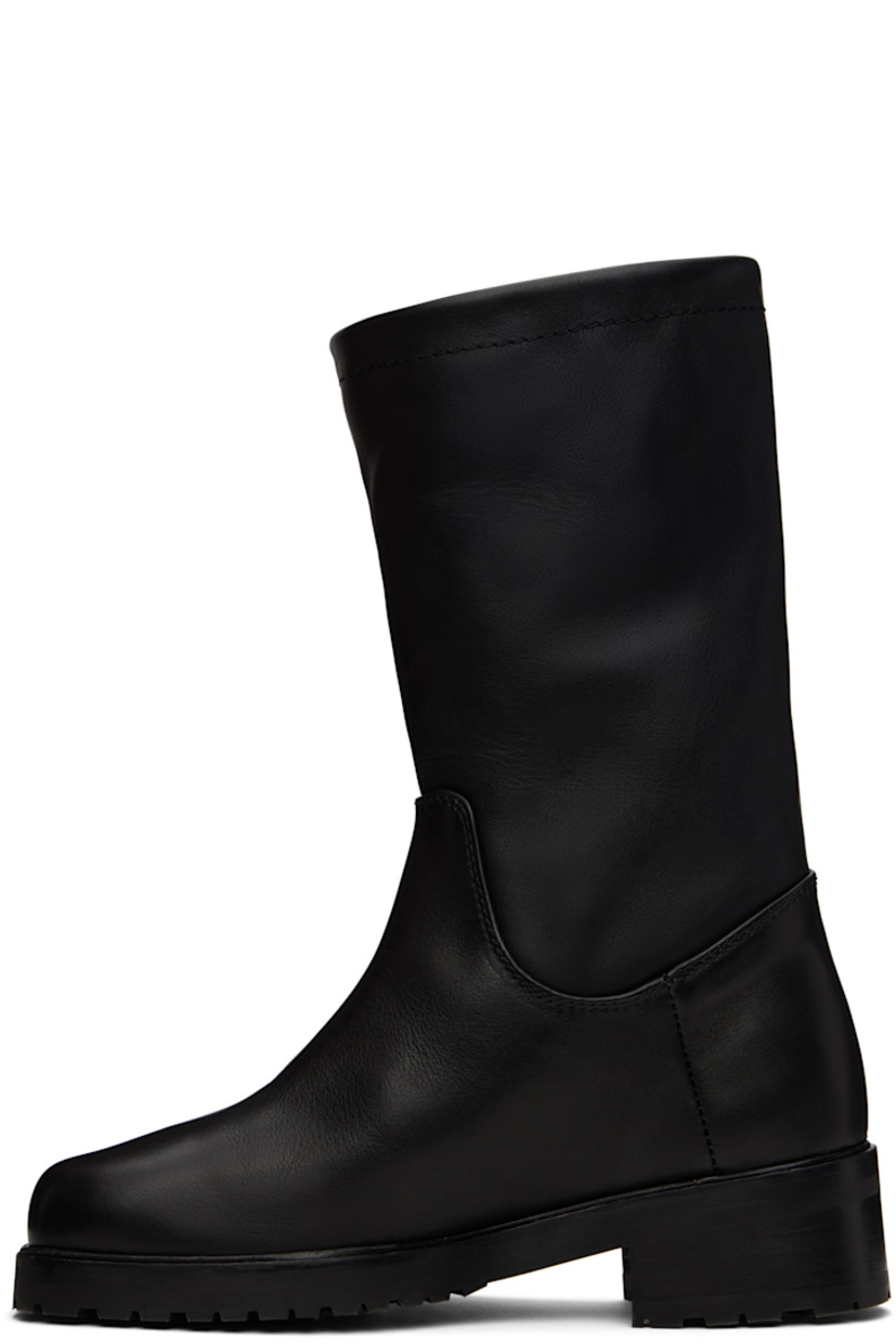 Mid-calf buffed calfskin boots in black.

· Square toe
· Stacked leather block heel and midsole
· Treaded rubber sole
· Heel: H1.75"

Supplier color: Black calf