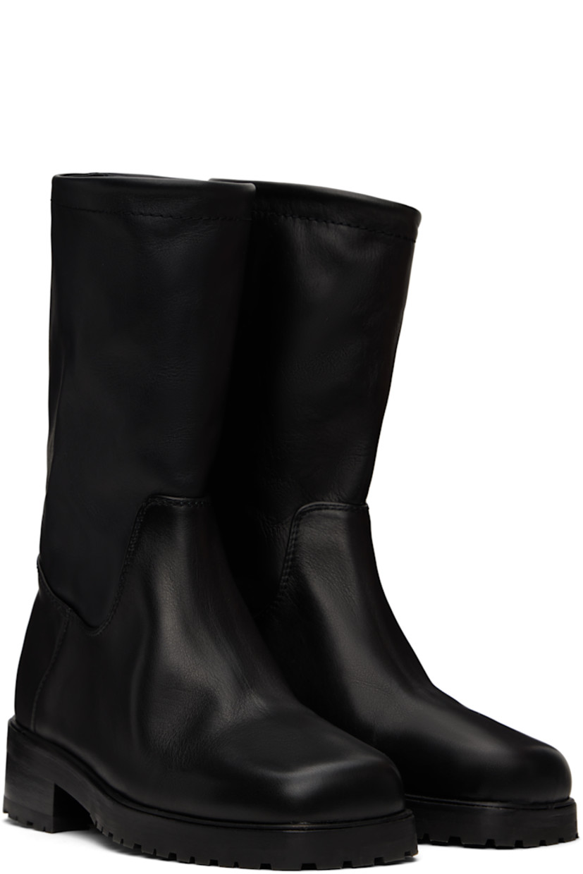 Mid-calf buffed calfskin boots in black.

· Square toe
· Stacked leather block heel and midsole
· Treaded rubber sole
· Heel: H1.75"

Supplier color: Black calf
