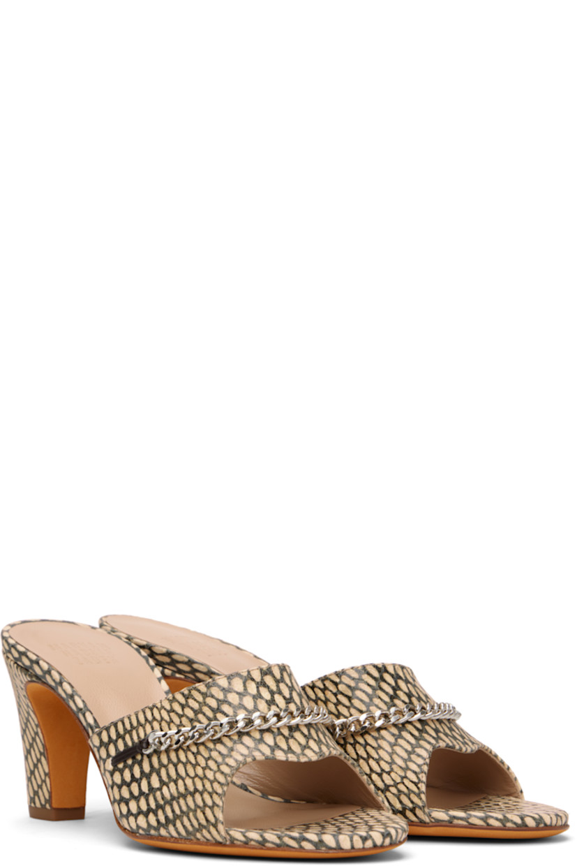 Snake-embossed calfskin sandals in beige.

· Open toe
· Curb chain appliqué at vamp
· Logo embossed at padded leather footbed
· Covered stiletto heel with rubber injection
· Nubuck sole
· Heel: H2.75"

Supplier color: Cape cobra