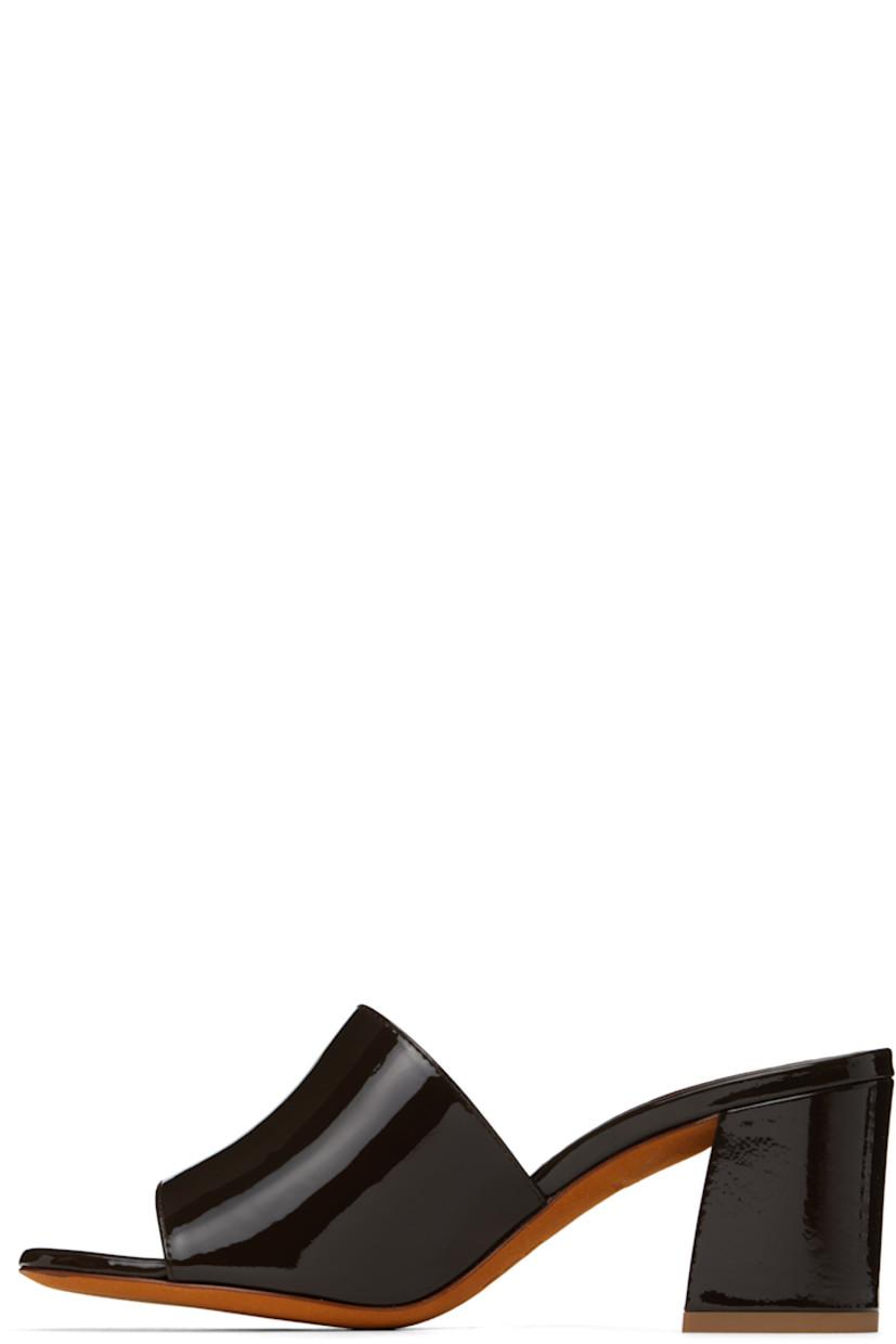 Patent calfskin heeled sandals in brown.

· Open toe
· Logo embossed at padded leather footbed
· Covered block heel with rubber injection
· Nubuck sole
· Heel: H2.5"

Supplier color: Carob