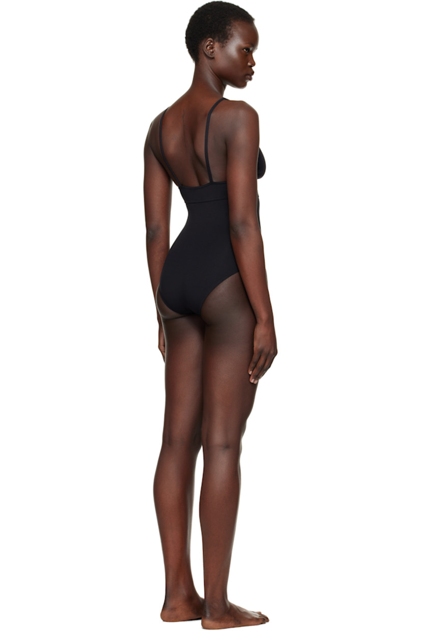 Stretch nylon jersey one-piece swimsuit.

· Plunging V-neck 
· Fixed shoulder straps
· Partial jersey lining

Supplier color: Noir