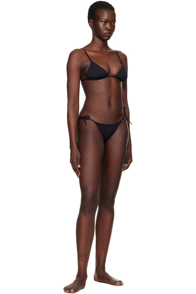 Stretch nylon jersey bikini bottom.

· Self-tie fastening at sides
· Partial jersey lining

Supplier color: Noir