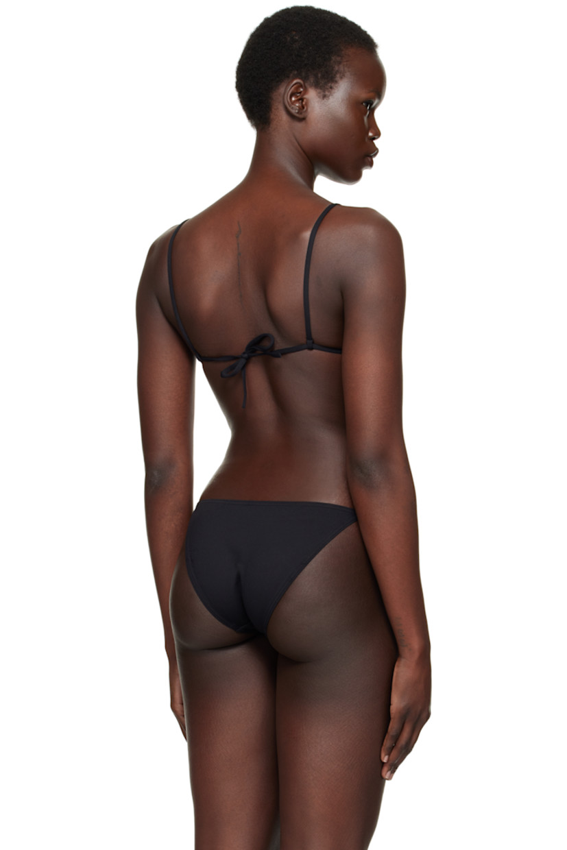 Stretch nylon jersey bikini top.

· Self-tie halter strap
· Self-tie fastening at back
· Unlined

Supplier color: Noir