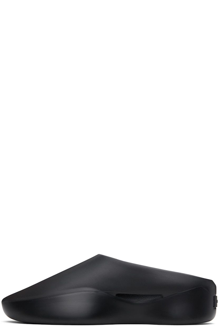 Foam rubber slip-on loafers in black. 

· Cutout at inner side 
· Logo embossed at footbed
· Logo patch at heel 
· Extrabounce foam rubber midsole
· Treaded XL Extralight® rubber sole

Supplier color: Black