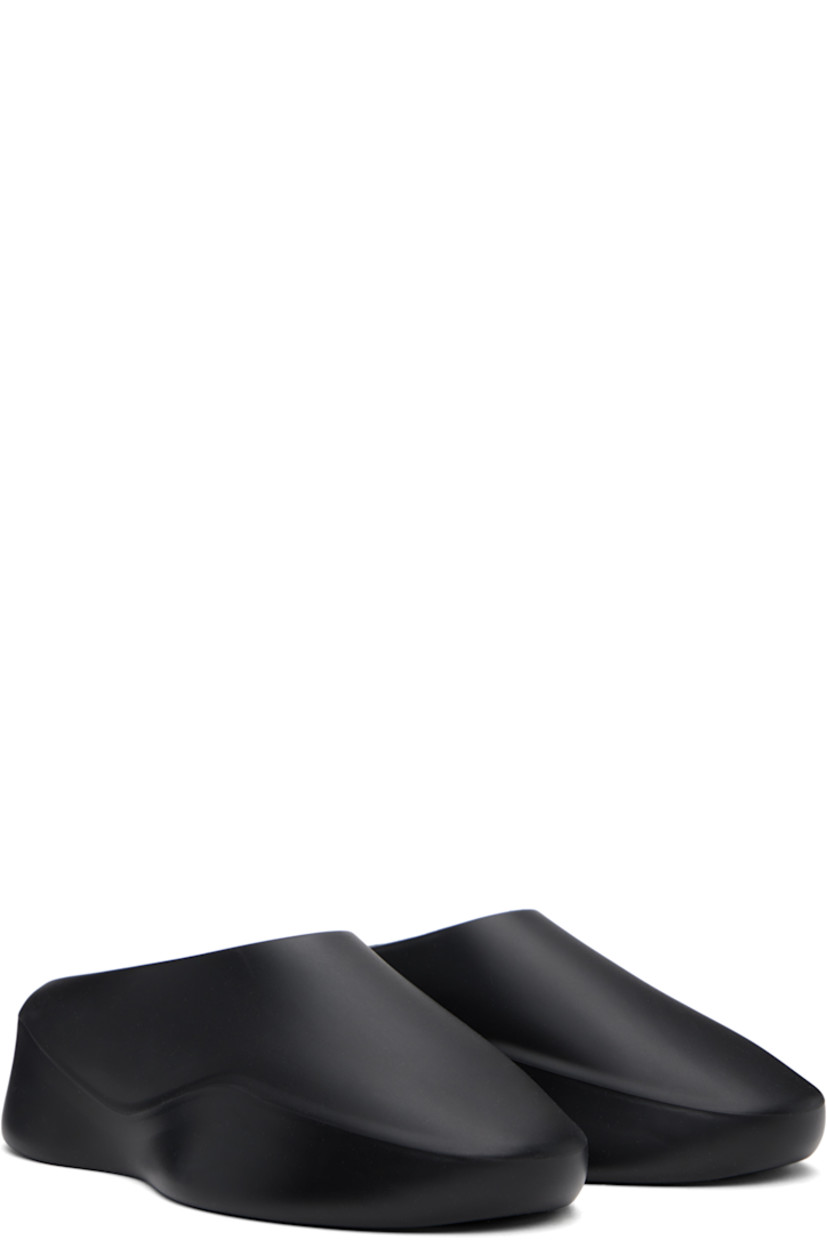 Foam rubber slip-on loafers in black. 

· Cutout at inner side 
· Logo embossed at footbed
· Logo patch at heel 
· Extrabounce foam rubber midsole
· Treaded XL Extralight® rubber sole

Supplier color: Black