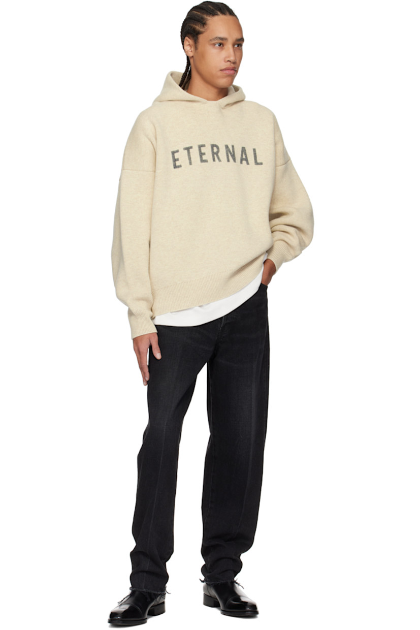 Tapered non-stretch denim jeans. Fading and whiskering throughout.

· Belt loops
· Five-pocket styling
· Button fly
· Rubberized logo patch at front
· Creased legs 
· Frayed edge at cuffs 
· Logo-engraved bronze-tone hardware

Supplier color: Black