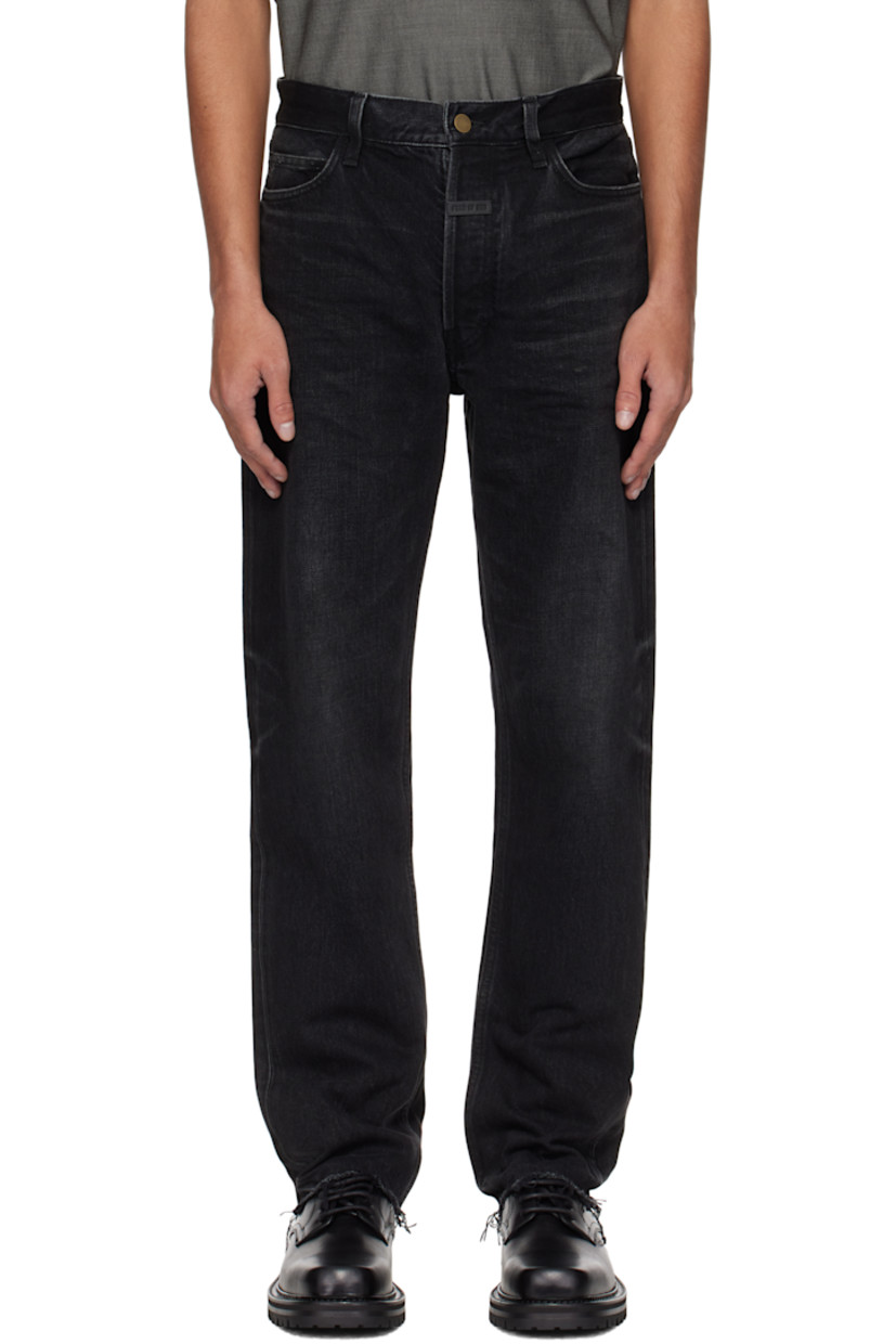 Straight-leg non-stretch denim jeans. Fading and whiskering throughout. 

· Belt loops
· Five-pocket styling
· Button fly
· Rubberized logo patch at front
· Frayed edge at cuffs 
· Logo-engraved bronze-tone hardware
· Contrast stitching in tan 

Supplier color: Black