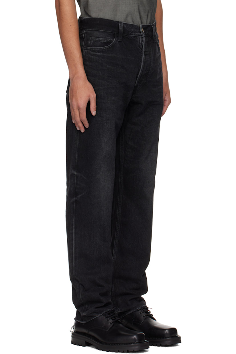 Straight-leg non-stretch denim jeans. Fading and whiskering throughout. 

· Belt loops
· Five-pocket styling
· Button fly
· Rubberized logo patch at front
· Frayed edge at cuffs 
· Logo-engraved bronze-tone hardware
· Contrast stitching in tan 

Supplier color: Black