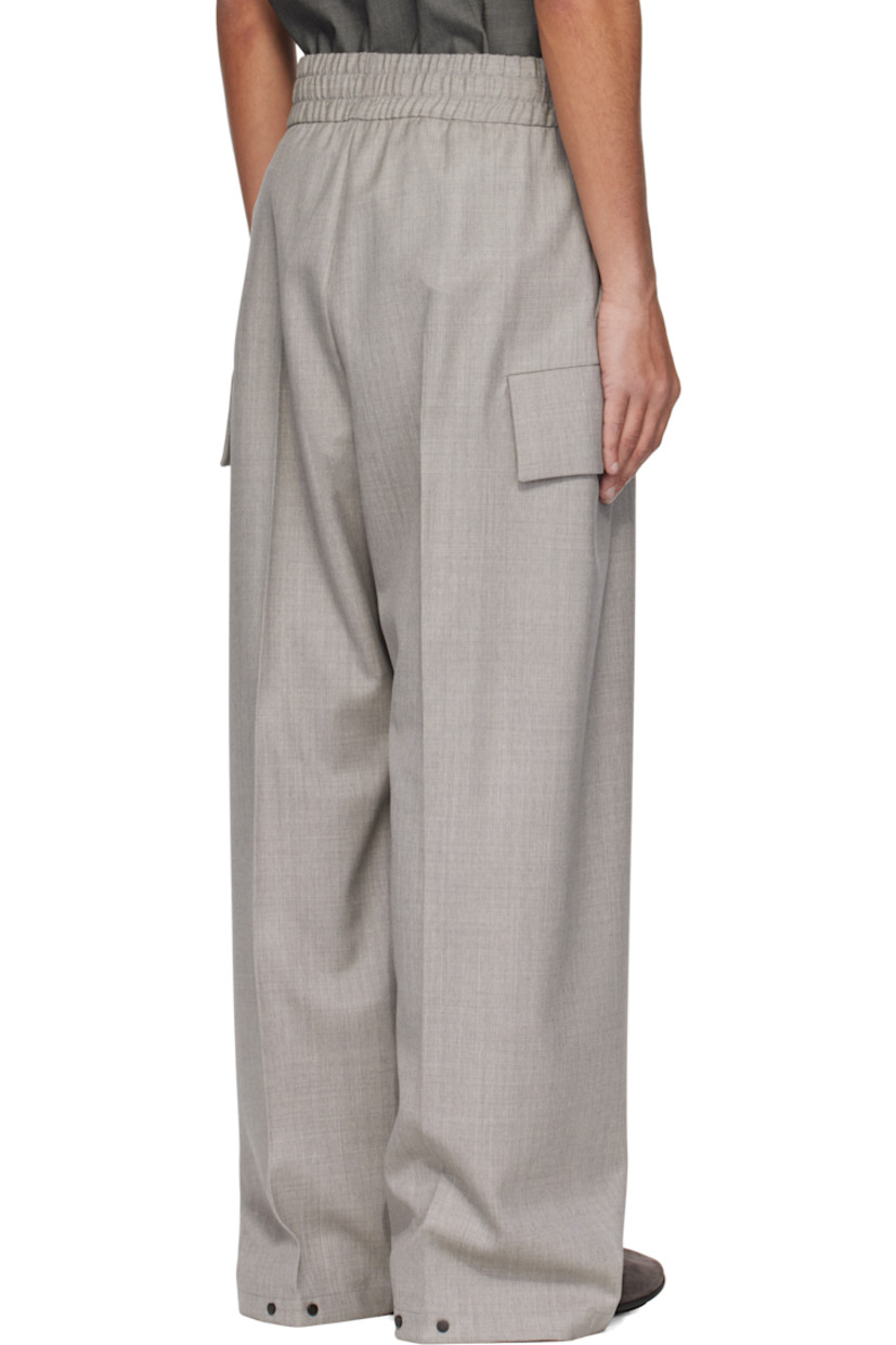 Wide-leg virgin wool tweed cargo pants. 

· Drawstring at elasticized waistband 
· Two-pocket styling 
· Rubberized logo patch and pleats at front 
· Adjustable press-stud fastening at cuffs 
· Patch pocket at outseams 
· Creased legs 

Supplier color: Melange grey