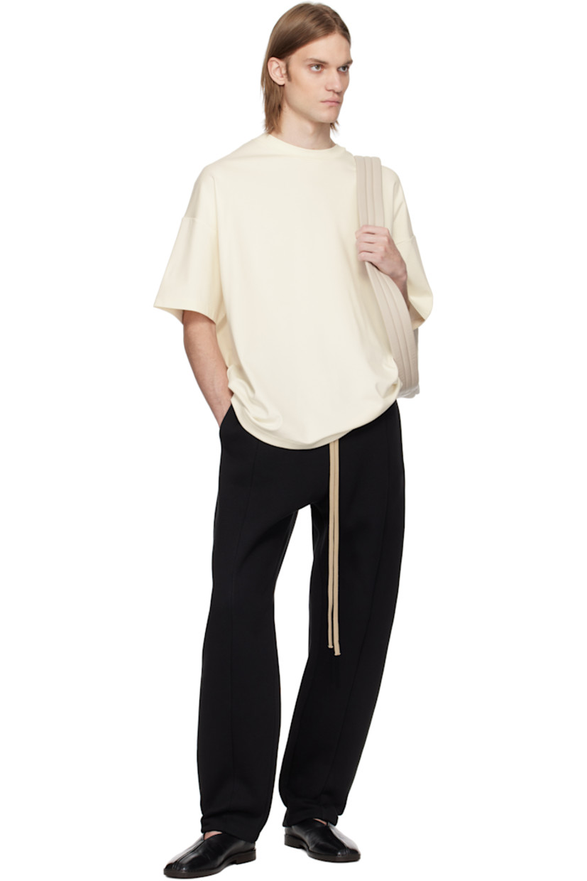 Heavyweight cotton-blend fleece sweatpants. 

· Loose-fit and straight-leg
· Drawstring at elasticized waistband 
· Two-pocket styling
· Rubberized logo patch at front
· Central seam at front legs
· Dropped inseam 
· Elasticized cuffs

Supplier color: Black