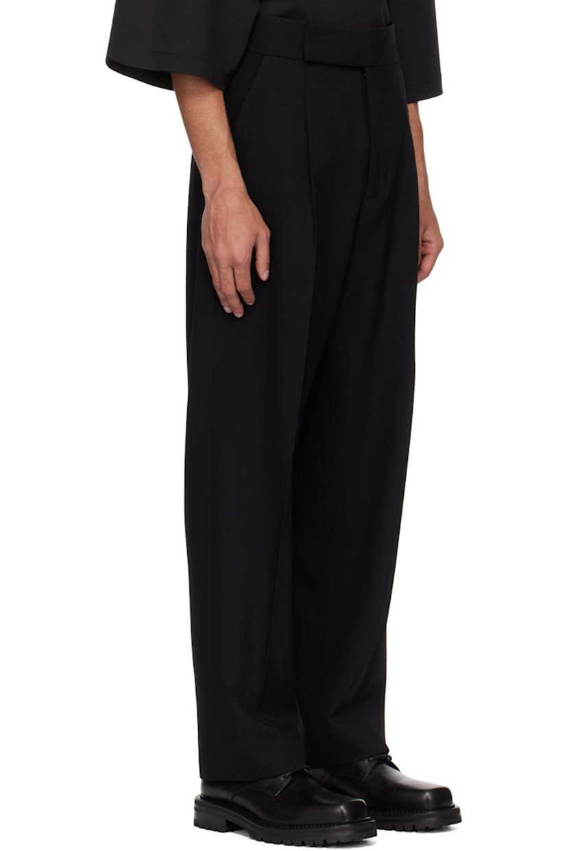 Straight-leg virgin wool gabardine trousers. 

· Four-pocket styling 
· Zip-fly 
· Pleats at front 
· Rubberized logo patch at back
· Creased legs 
· Full satin lining 
· Logo-engraved gunmetal-tone hardware

Supplier color: Black