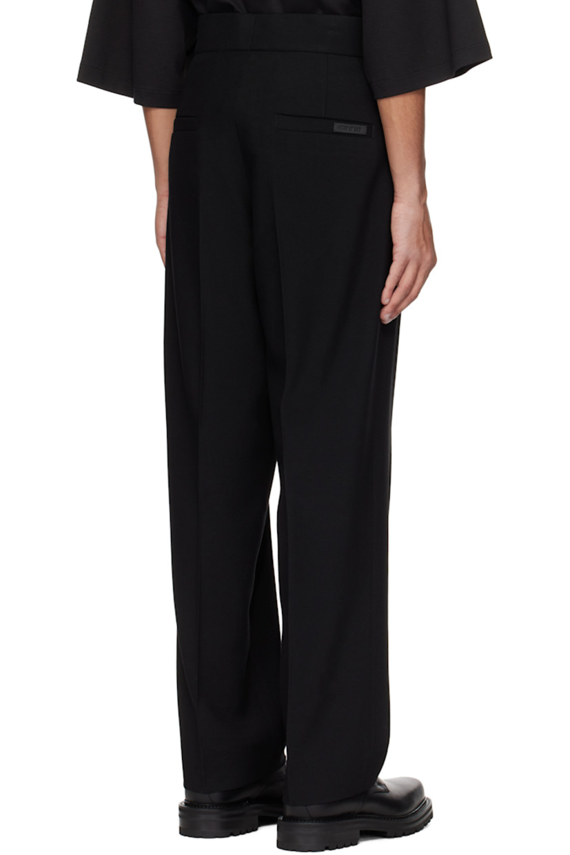 Straight-leg virgin wool gabardine trousers. 

· Four-pocket styling 
· Zip-fly 
· Pleats at front 
· Rubberized logo patch at back
· Creased legs 
· Full satin lining 
· Logo-engraved gunmetal-tone hardware

Supplier color: Black