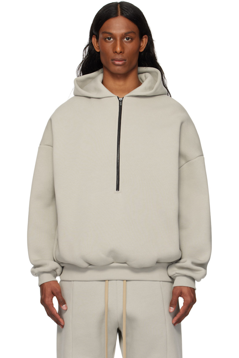 Cotton-blend fleece hoodie.

· Logo patch at hood
· Half zip closure
· Seam pockets
· Rib-knit hem and cuffs
· Dropped shoulders
· Text embossed at back

Part of the Eternal collection.

Supplier color: Dove grey