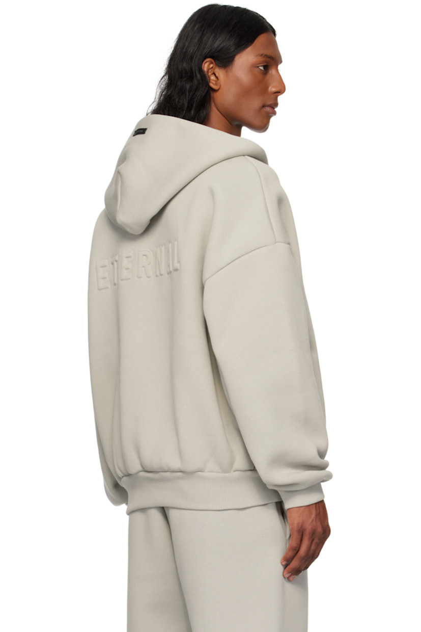 Cotton-blend fleece hoodie.

· Logo patch at hood
· Half zip closure
· Seam pockets
· Rib-knit hem and cuffs
· Dropped shoulders
· Text embossed at back

Part of the Eternal collection.

Supplier color: Dove grey