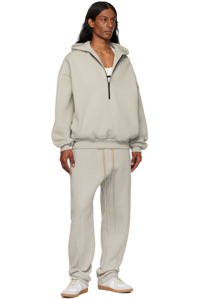 Cotton-blend fleece hoodie.

· Logo patch at hood
· Half zip closure
· Seam pockets
· Rib-knit hem and cuffs
· Dropped shoulders
· Text embossed at back

Part of the Eternal collection.

Supplier color: Dove grey