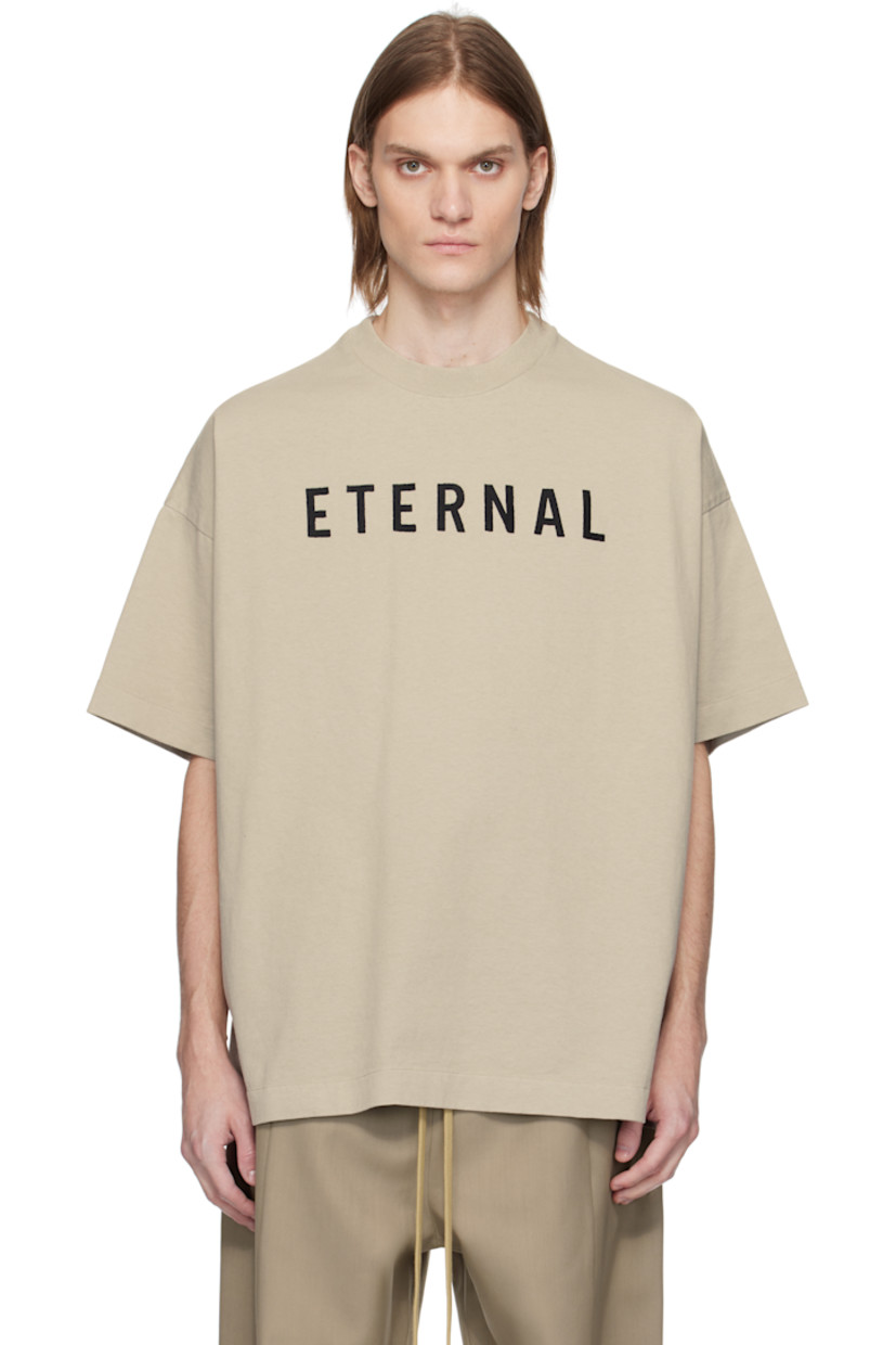 Heavyweight cotton jersey T-shirt. 

· Rib-knit crewneck
· Text embroidered at chest
· Dropped shoulders 
· Rubberized logo patch at back collar

Supplier color: Dove grey