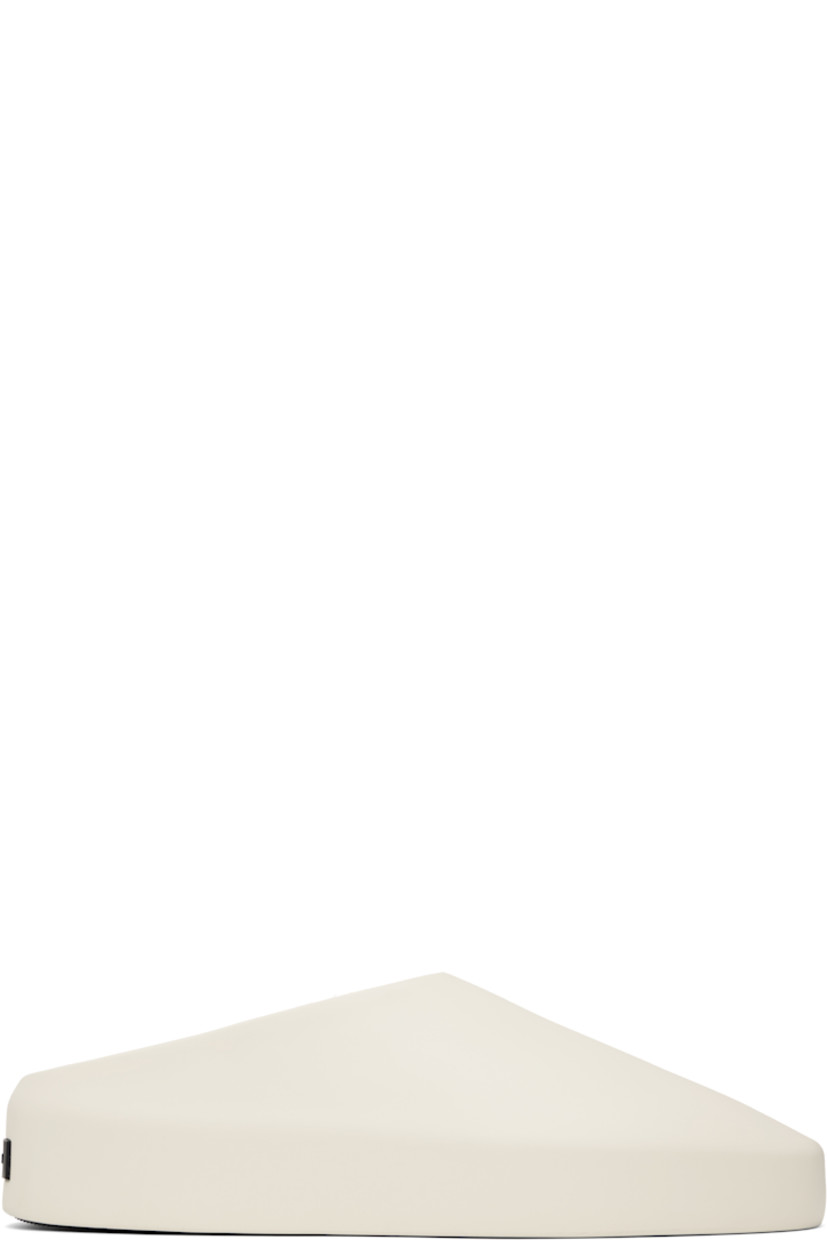 Foam rubber slip-on loafers in off-white.

· Rubber logo patch at heel 
· Removable logo-embossed buffed leather insole
· Extrabounce foam rubber midsole
· Treaded XL Extralight® rubber outsole

Supplier color: Cream