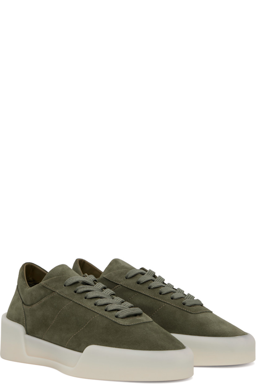 Low-top nubuck sneakers in khaki. 

· Lace-up closure
· Padded tongue and collar
· Rubber logo patch at heel
· Suede and buffed leather lining
· Rubber sole

Supplier color: Forest