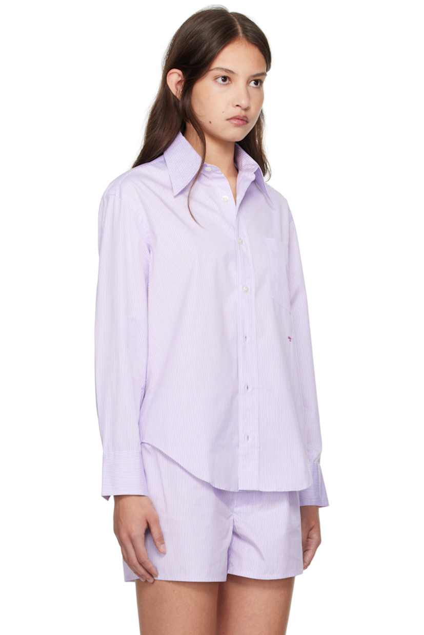 Cotton poplin shirt. Stripes throughout. 

· Spread collar 
· Button closure 
· Patch pocket at chest
· Logo embroidered at front
· Shirttail hem
· Pleat at single-button barrel cuffs

Supplier color: Lavender stripe