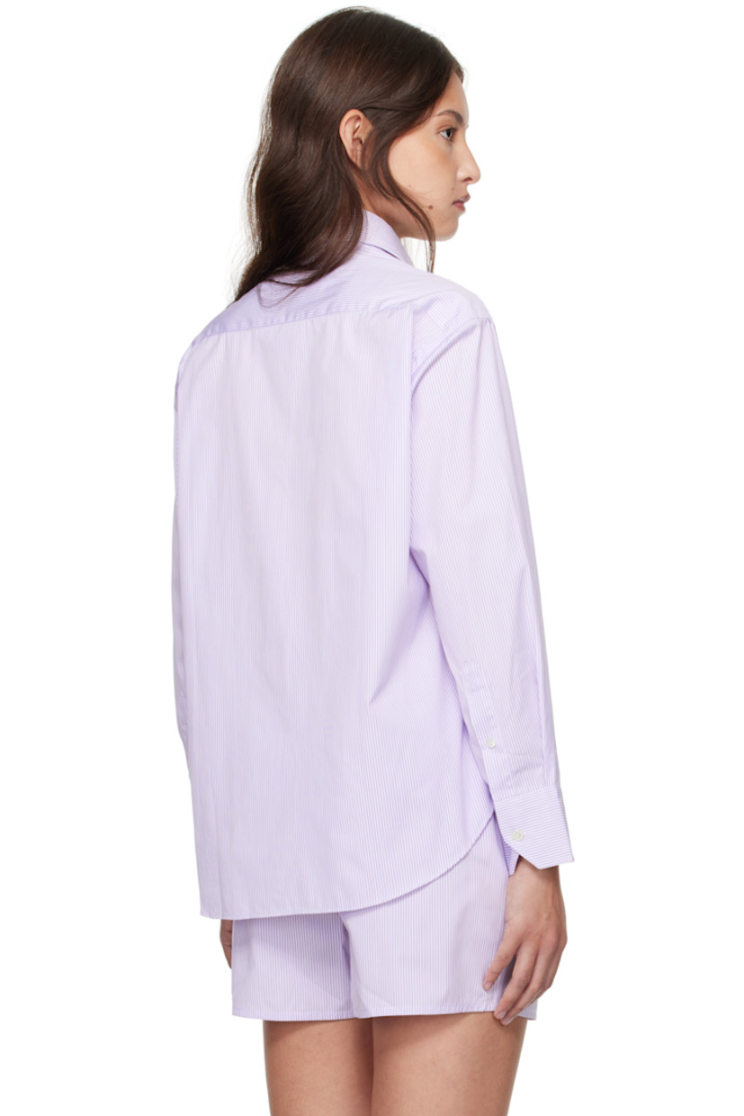 Cotton poplin shirt. Stripes throughout. 

· Spread collar 
· Button closure 
· Patch pocket at chest
· Logo embroidered at front
· Shirttail hem
· Pleat at single-button barrel cuffs

Supplier color: Lavender stripe