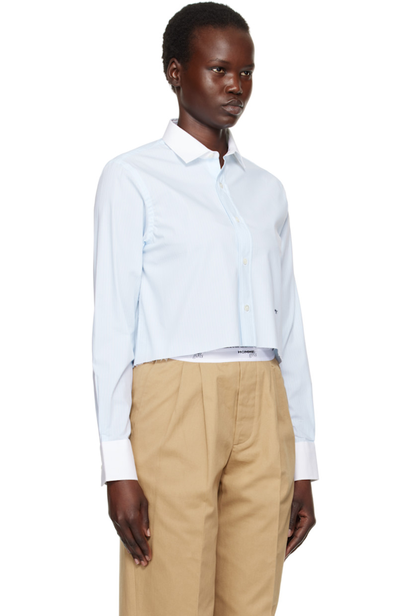 Stretch cotton chambray shirt. Stripes throughout.

· Spread collar
· Button closure
· Logo embroidered at front
· Raw edge at cropped hem
· Pleat at adjustable single-button barrel cuffs
· Box pleat at back yoke

Supplier color: Ticking stripe