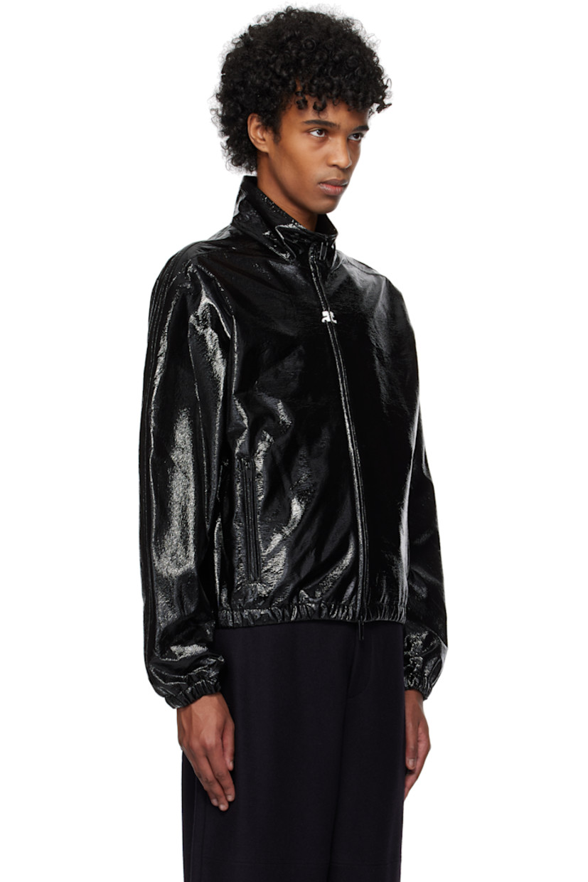 Lightweight stretch crinkled vinyl bomber jacket.

· Stand collar 
· Two-way zip closure
· Zip pockets
· Elasticized hem and cuffs 
· Logo flag at side seam
· Seam pocket at interior
· Satin lining

Supplier color: Black