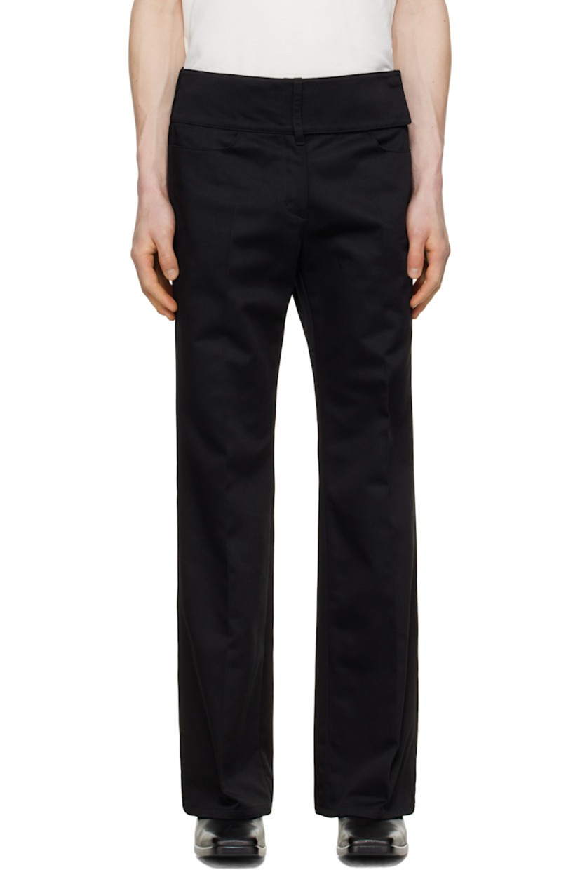 Bootcut polyester- and cotton-blend twill trousers.

· Belt loops
· Integrated hook-eye belt at waistband
· Four-pocket styling
· Zip fly
· Creased legs
· Embroidered logo patch at back pocket

Supplier color: Black