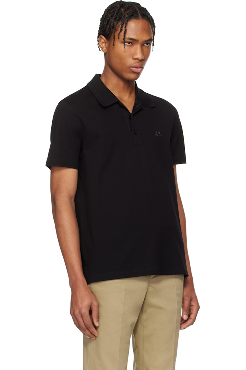 Cotton piqué polo. 

· Rib-knit spread collar
· Three-button placket
· Logo embroidered at chest
· Tennis-tail hem
· Extended loop with embroidered logo at back collar

Supplier color: Black