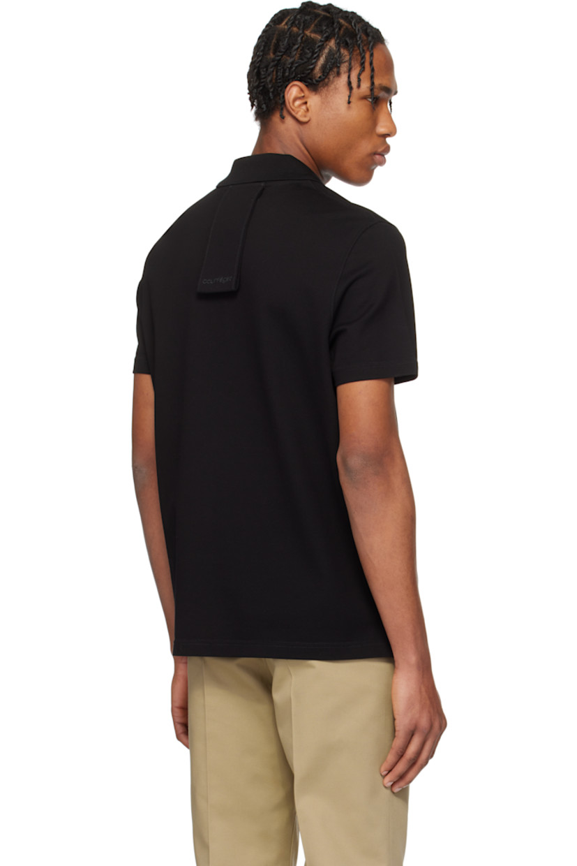 Cotton piqué polo. 

· Rib-knit spread collar
· Three-button placket
· Logo embroidered at chest
· Tennis-tail hem
· Extended loop with embroidered logo at back collar

Supplier color: Black