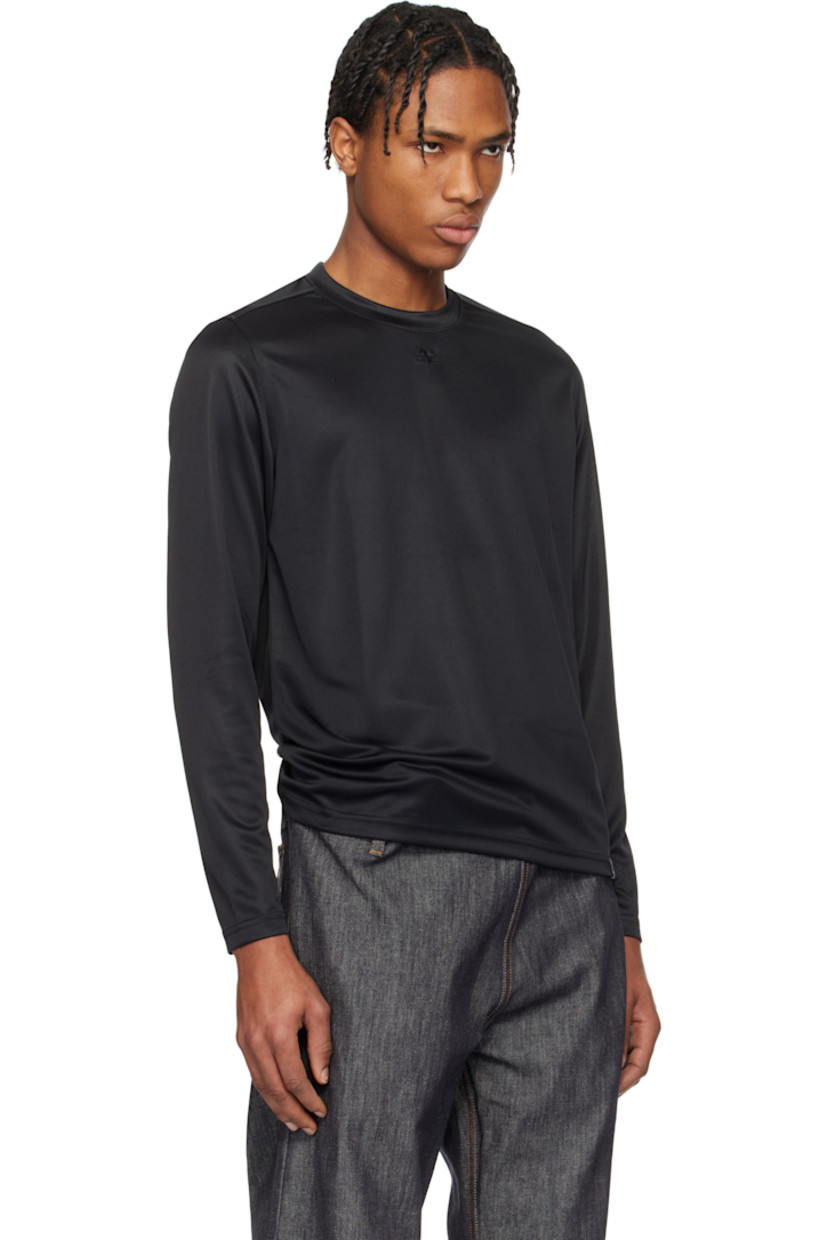 Polyester jersey T-shirt. 

· Crewneck
· Logo embroidered at chest 
· Logo flag at front hem
· Logo printed at back collar

Supplier color: Black