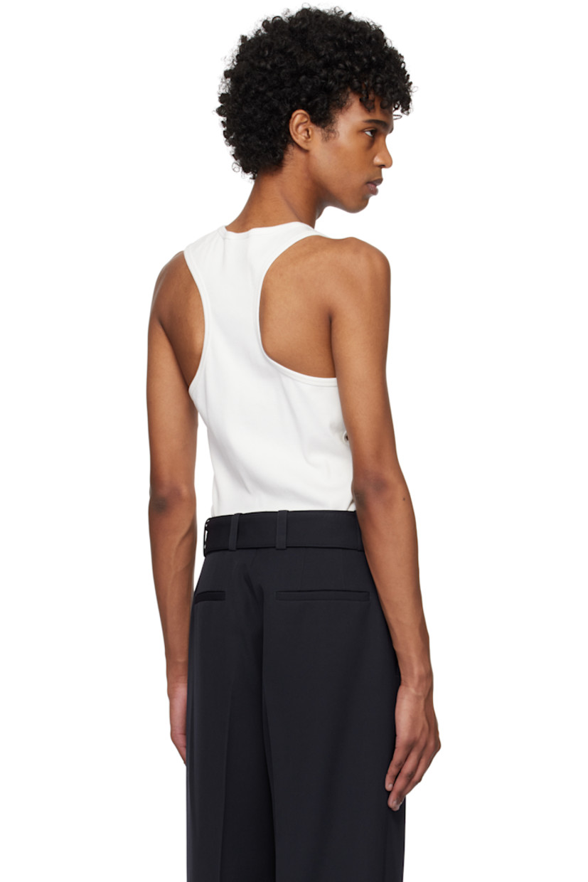 Rib-knit stretch cotton tank top.

· Scoop neck
· Logo embroidered at chest
· Button fastening at front and side
· Cutout at side
· Racerback

Supplier color: Heritage white