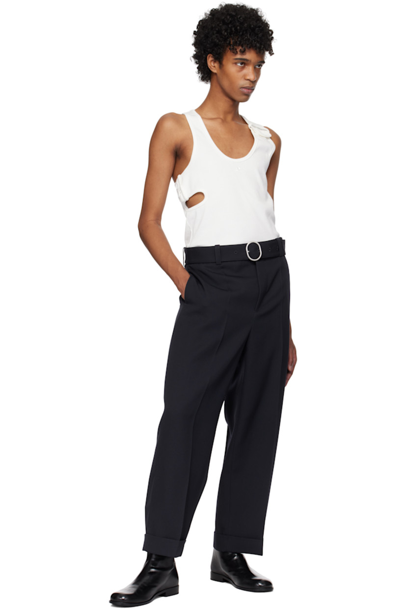 Rib-knit stretch cotton tank top.

· Scoop neck
· Logo embroidered at chest
· Button fastening at front and side
· Cutout at side
· Racerback

Supplier color: Heritage white