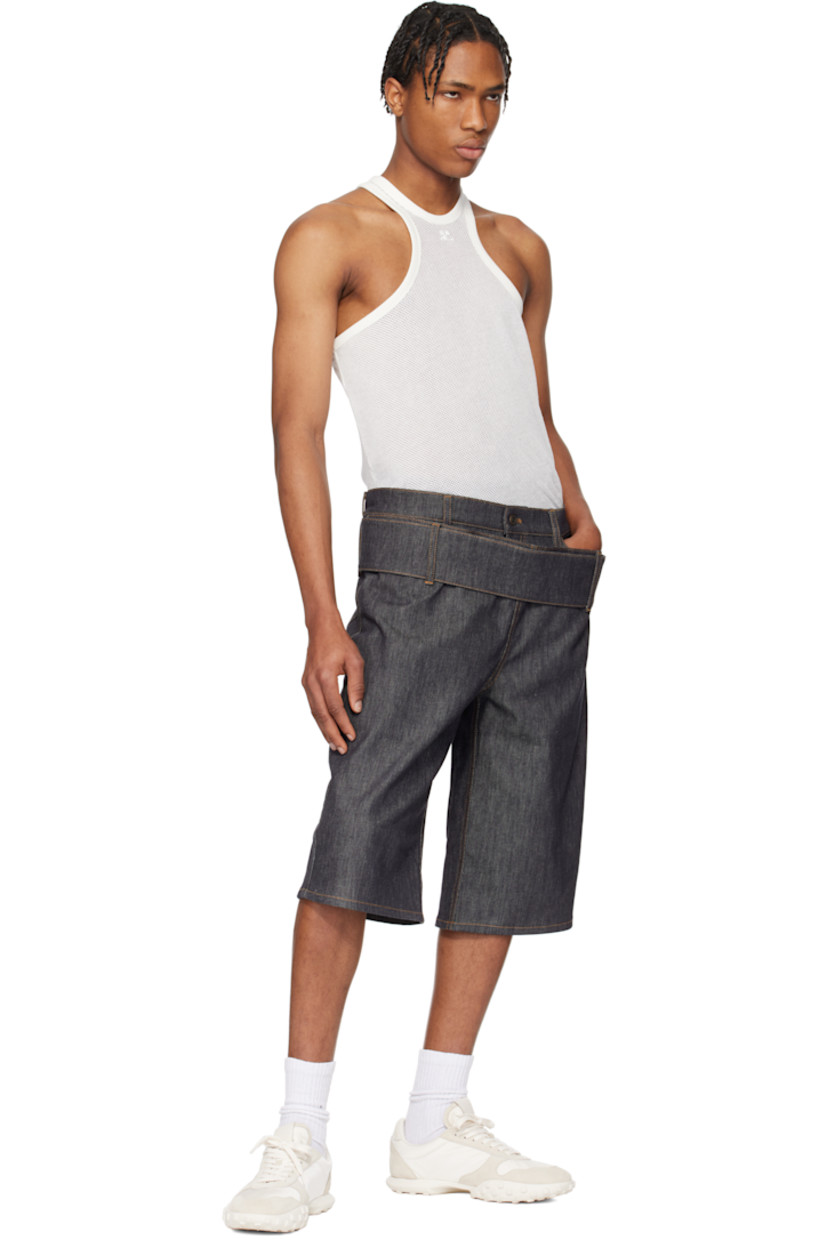 Semi-sheer polyester- and cotton-blend mesh tank top.

· Rib-knit crewneck and armscyes
· Embroidered logo patch at chest 
· Racer back

Supplier color: Heritage white
