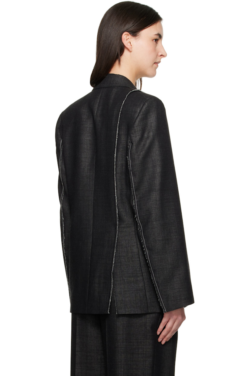 Virgin wool-blend delaine blazer. Raw edges throughout.

· Peaked lapel
· Double-breasted button closure
· Welt pocket at chest
· Flap pockets
· Logo patch at front hem
· Padded shoulders
· Vented back hem
· Welt pocket at interior
· Full viscose satin lining

Supplier color: Black
