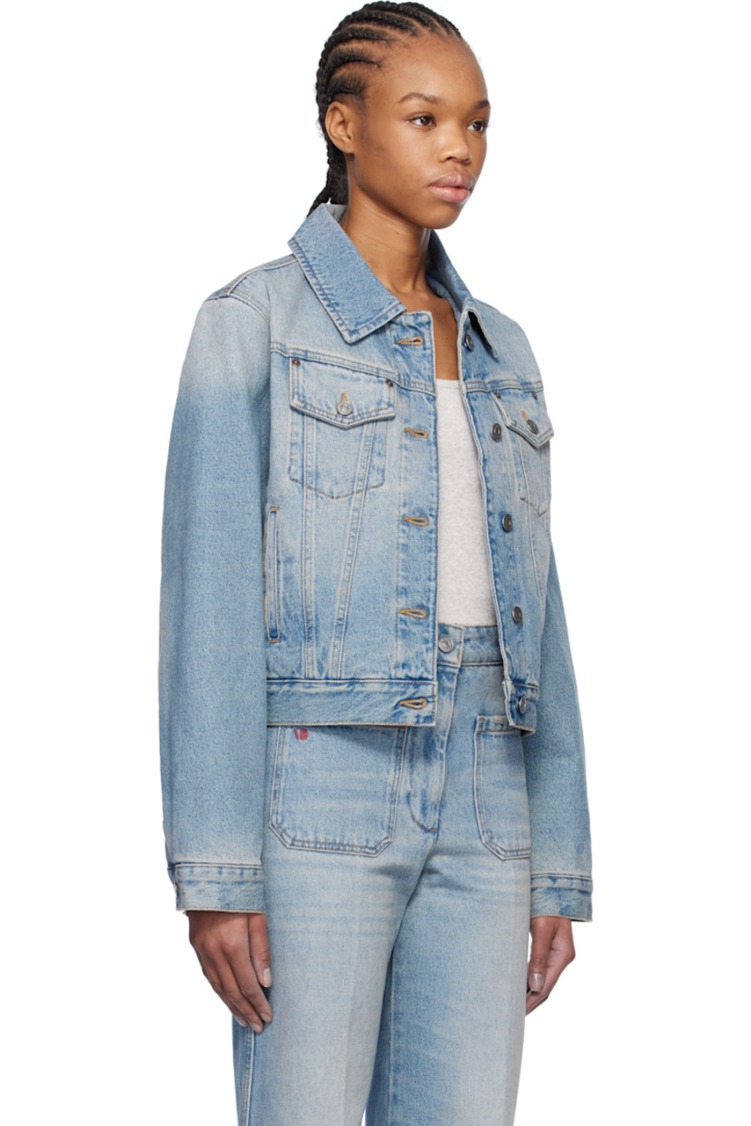 Loose-fit non-stretch denim jacket. Fading throughout. 

· Spread collar
· Flap and welt pockets
· Button closure
· Cropped hem
· Single-button cuffs
· Leather logo patch at back hem
· Full quilted satin lining
· Logo-engraved silver-tone hardware
· Contrast stitching in beige

Supplier color: Pale blue wash