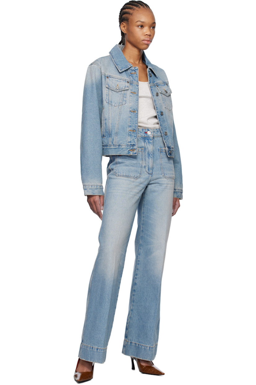 Loose-fit non-stretch denim jacket. Fading throughout. 

· Spread collar
· Flap and welt pockets
· Button closure
· Cropped hem
· Single-button cuffs
· Leather logo patch at back hem
· Full quilted satin lining
· Logo-engraved silver-tone hardware
· Contrast stitching in beige

Supplier color: Pale blue wash