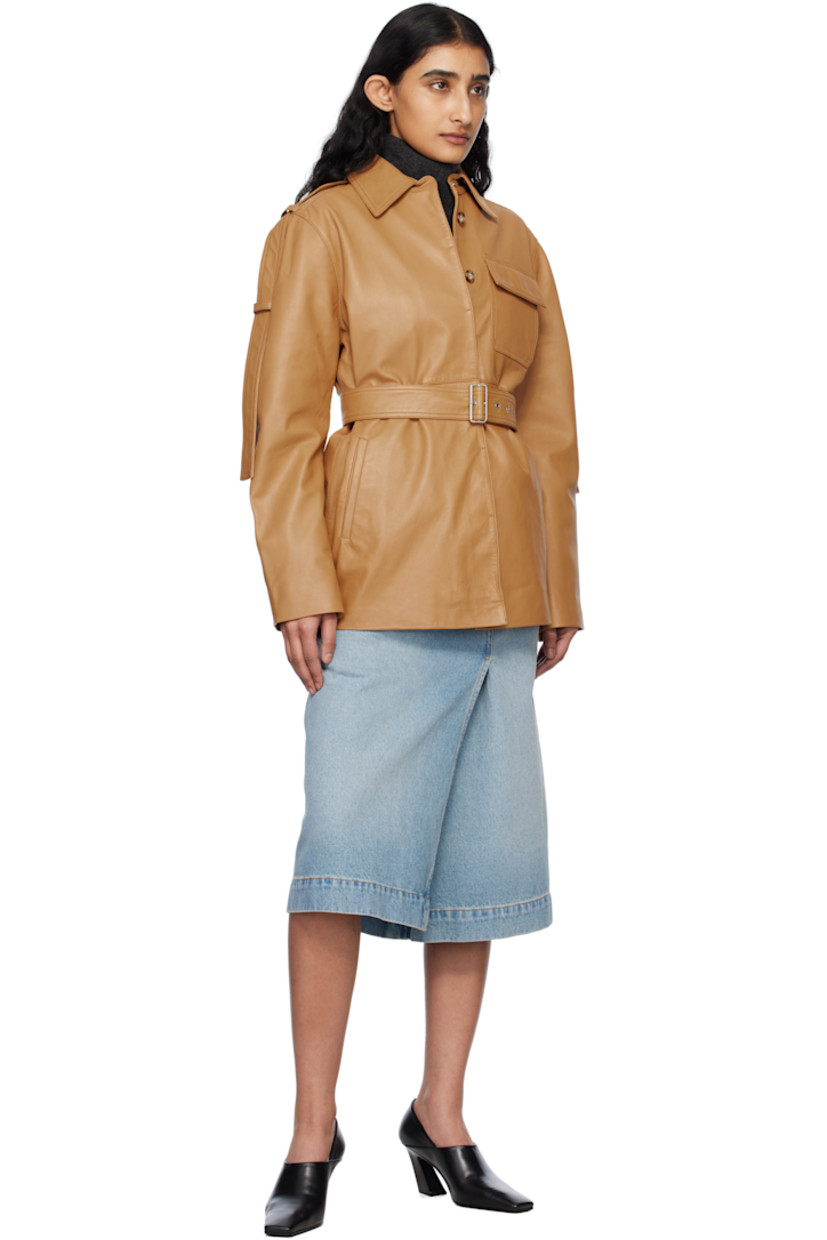 Non-stretch denim midi skirt. Fading throughout. 

· Mock-wrap construction
· Belt loops
· Three-pocket styling
· Dart at front
· Offset vent at front and back
· Zip closure with button tab at side
· Leather logo patch at back waistband
· Contrast stitching in tan and red

Supplier color: Pale blue wash