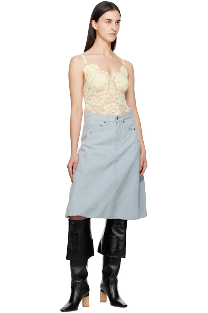 Non-stretch recycled cotton-blend denim midi skirt. Fading throughout.

· Belt loops
· Five-pocket styling
· Zip fly
· Bubble hem
· Logo patch at back waistband
· Full twill lining
· Contrast stitching in tan

Supplier color: Light azul