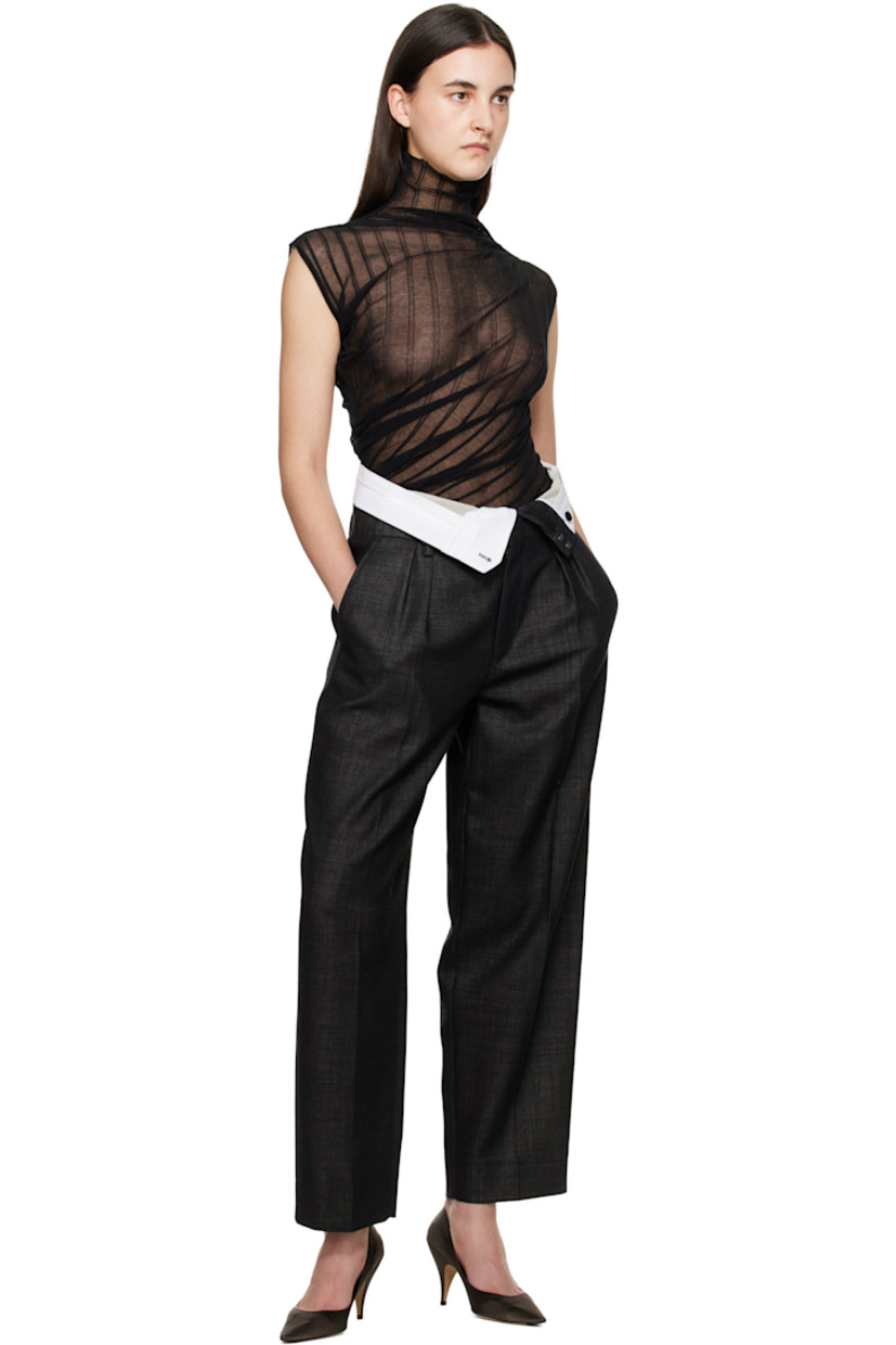 Sheer rib-knit cotton-blend tank top.

· Draped and asymmetrical construction
· Turtleneck
· Extended satin trim at hem side seam
· Logo-embroidered locker loop at back collar

Supplier color: Black