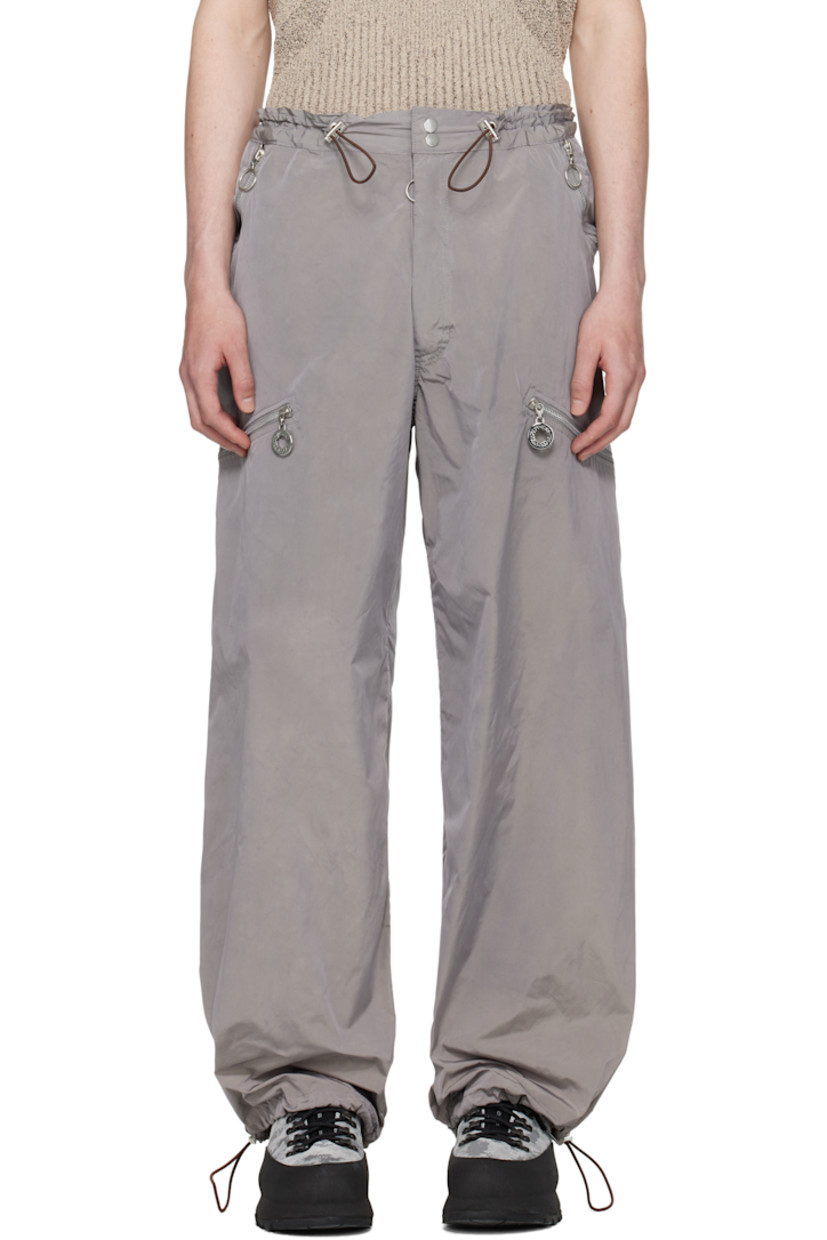 Hand- and garment-dyed nylon taffeta cargo pants.

· Bungee-style drawstring at elasticized waistband and cuffs
· Two-pocket styling
· Zip fly
· Zip pockets at front
· Logo-engraved silver-tone hardware

Available exclusively at SSENSE.

Supplier color: Graphite