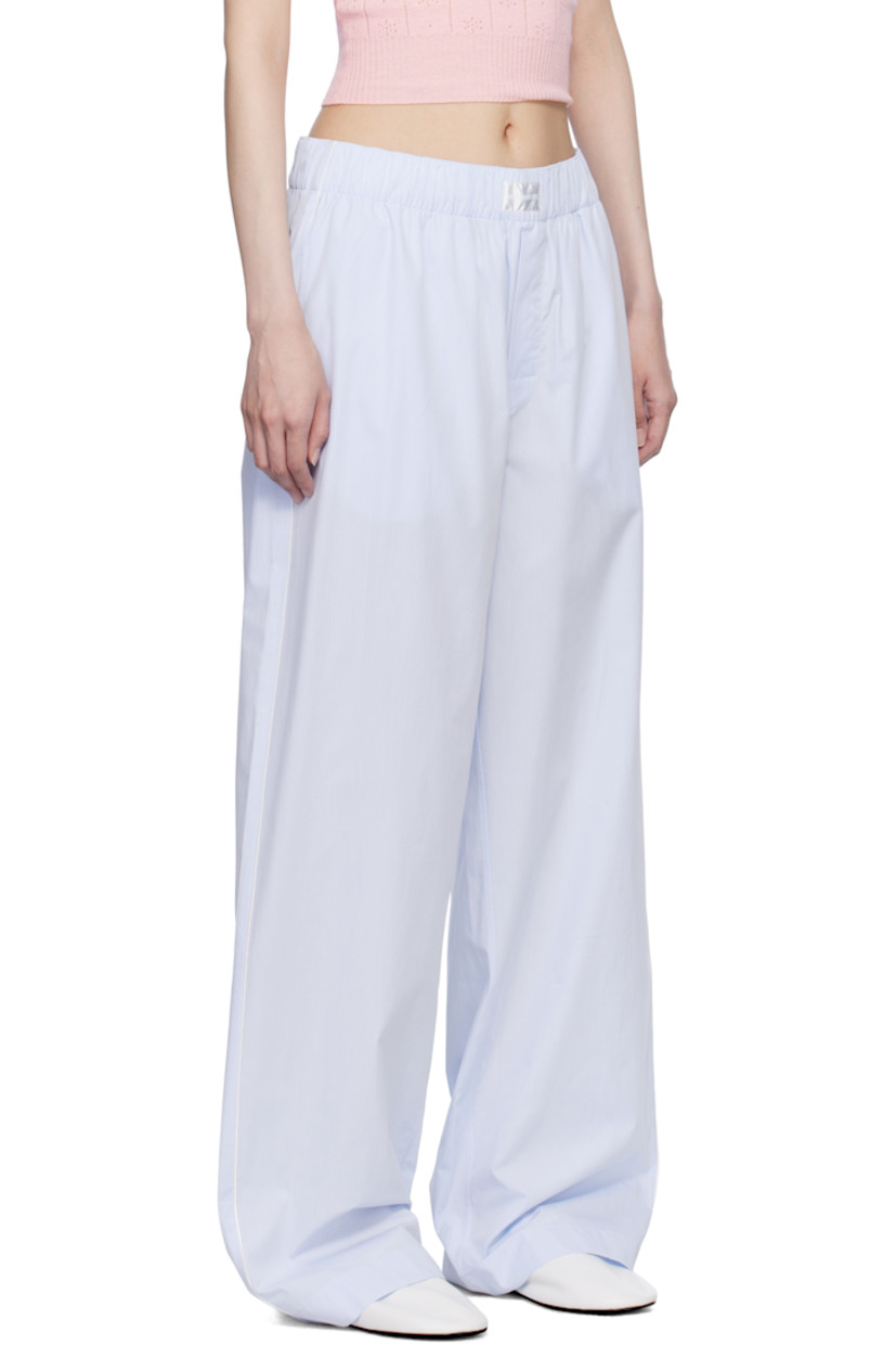 Mercerized Supima® cotton poplin pyjama pants. Jacquard polka-dot pattern throughout.

· 300 thread count
· Concealed drawstring at elasticized waistband
· Logo patch at waistband
· Two-pocket styling 
· Button fly 
· Vented cuffs
· Piping at outseams 

Supplier color: Light blue dots