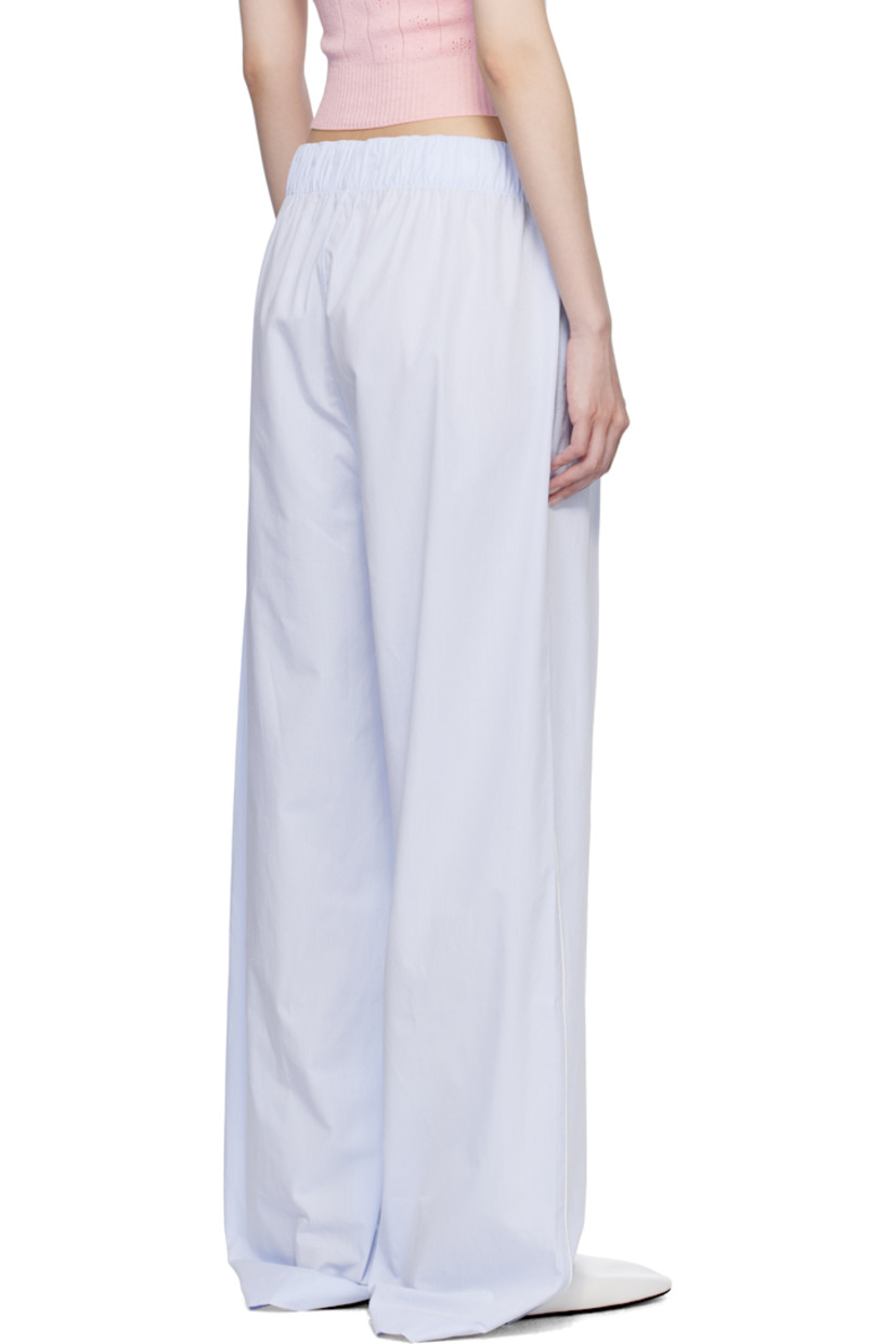 Mercerized Supima® cotton poplin pyjama pants. Jacquard polka-dot pattern throughout.

· 300 thread count
· Concealed drawstring at elasticized waistband
· Logo patch at waistband
· Two-pocket styling 
· Button fly 
· Vented cuffs
· Piping at outseams 

Supplier color: Light blue dots