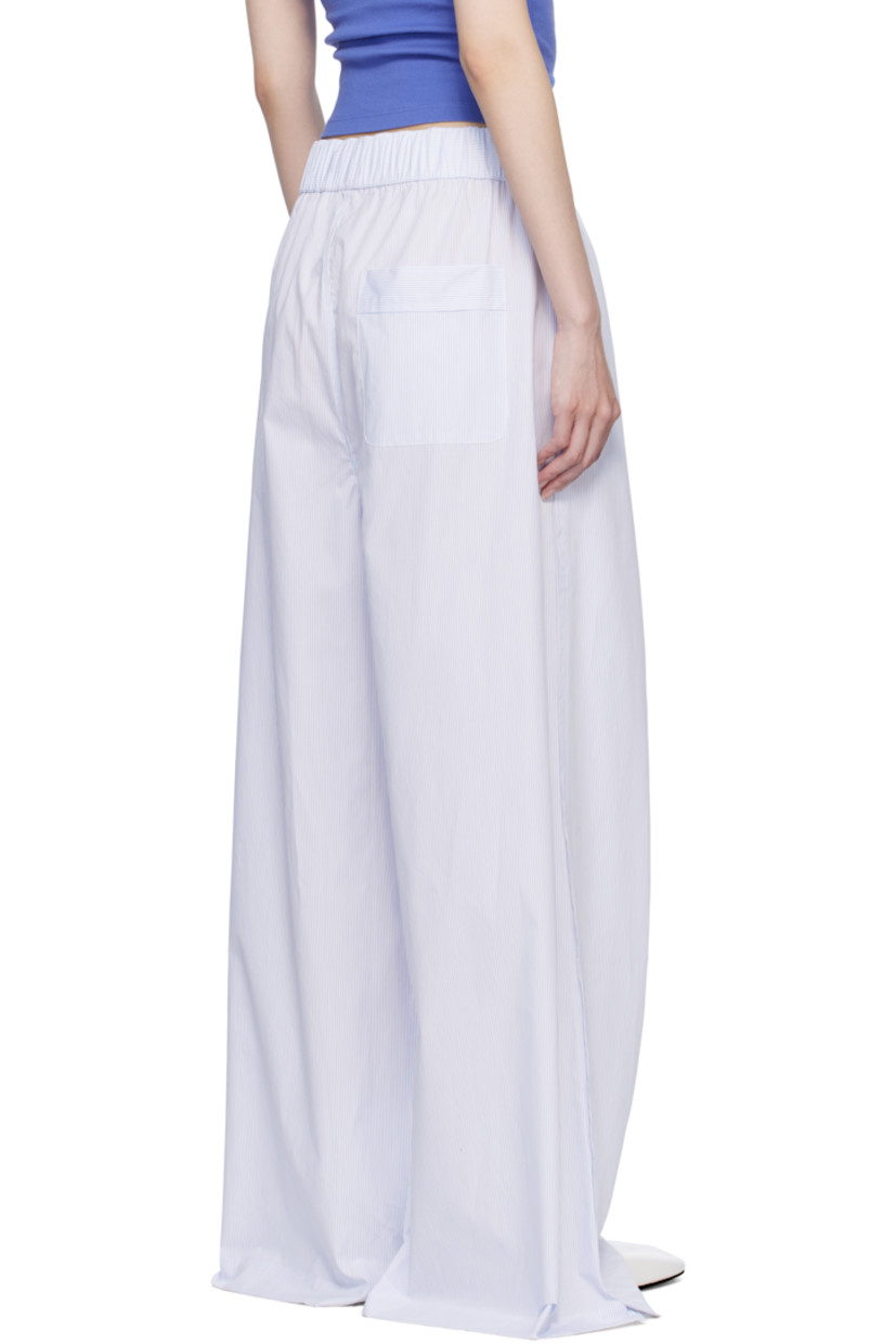 Mercerized Supima® cotton poplin pyjama pants. Stripes throughout.

· Wide-leg 
· 300 thread count
· Concealed drawstring at elasticized waistband
· Logo patch at waistband
· Three-pocket styling 
· Button fly 
· Pleats at front
· Vented cuffs
· Mother-of-pearl hardware

Supplier color: Light blue stripes