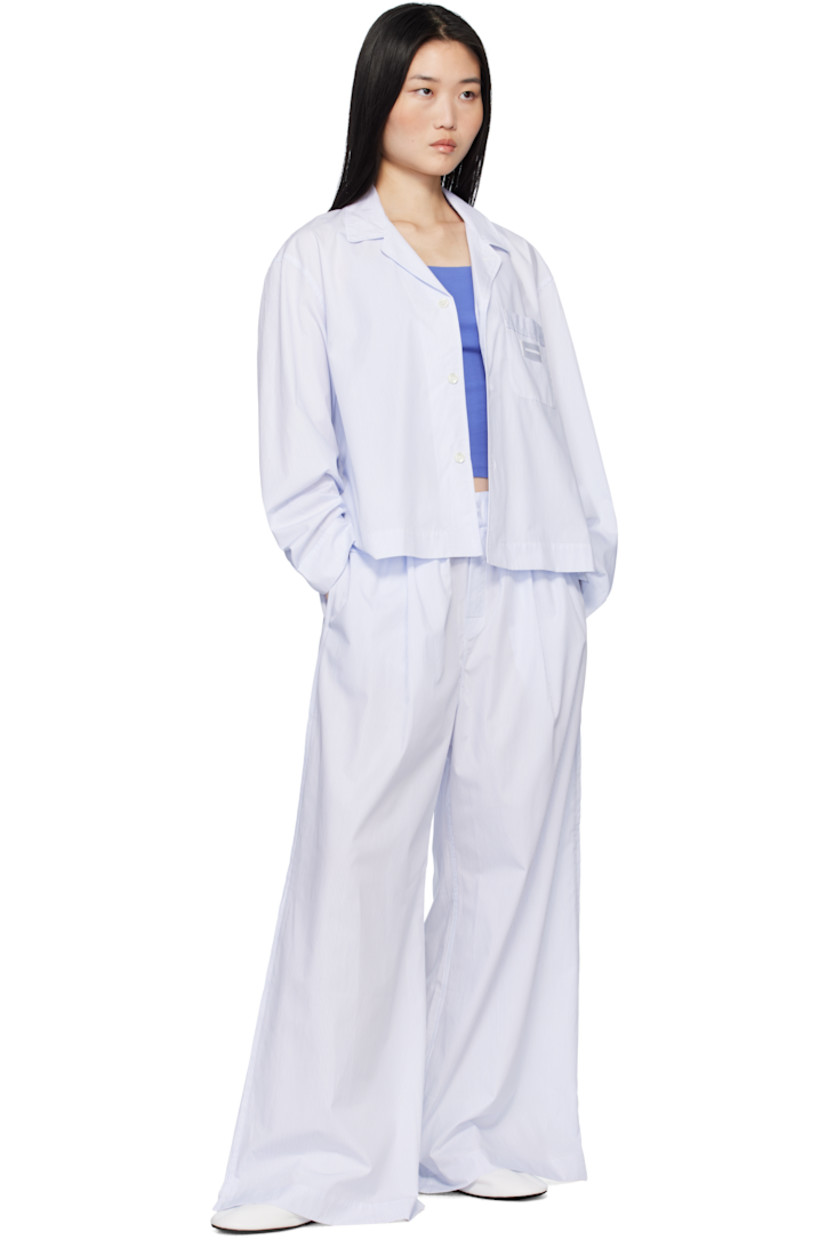 Mercerized Supima® cotton poplin pyjama pants. Stripes throughout.

· Wide-leg 
· 300 thread count
· Concealed drawstring at elasticized waistband
· Logo patch at waistband
· Three-pocket styling 
· Button fly 
· Pleats at front
· Vented cuffs
· Mother-of-pearl hardware

Supplier color: Light blue stripes