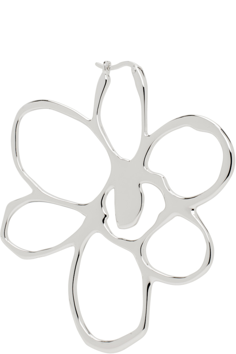 Single drop earring in sterling silver. 

· Logo engraved at side
· Hinged-post fastening 
· H2.25" x W2"

Supplier color: Silver