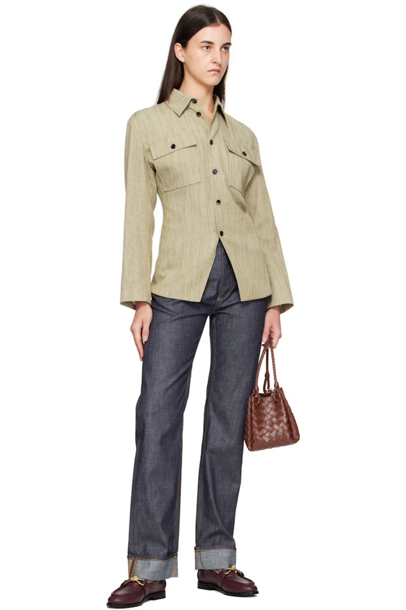 Intrecciato-woven buffed lambskin shoulder bag.

· Fixed shoulder straps with knot hardware 
· Adjustable and detachable crossbody strap
· Magnetic closure
· H7.5" x W9" x D6"

Supplier color: Sapele