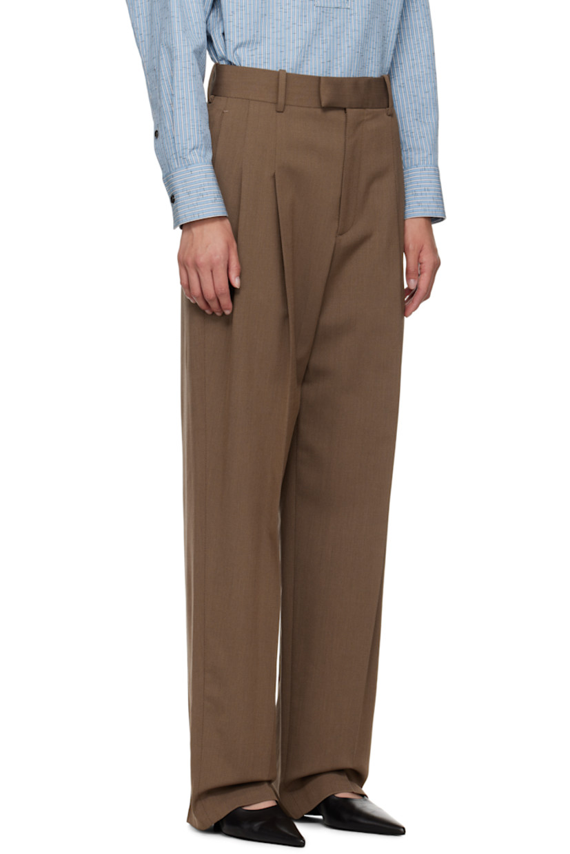 Stretch wool-blend tricotine trousers.

· Straight-leg
· Belt loops
· Three-pocket styling
· Zip fly
· Creased legs
· Partial poplin lining

Supplier color: Ebony/Light Jute Melange