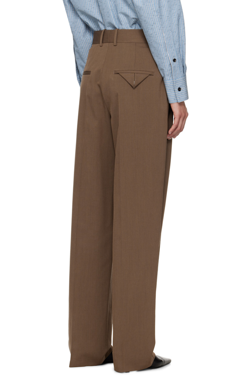 Stretch wool-blend tricotine trousers.

· Straight-leg
· Belt loops
· Three-pocket styling
· Zip fly
· Creased legs
· Partial poplin lining

Supplier color: Ebony/Light Jute Melange