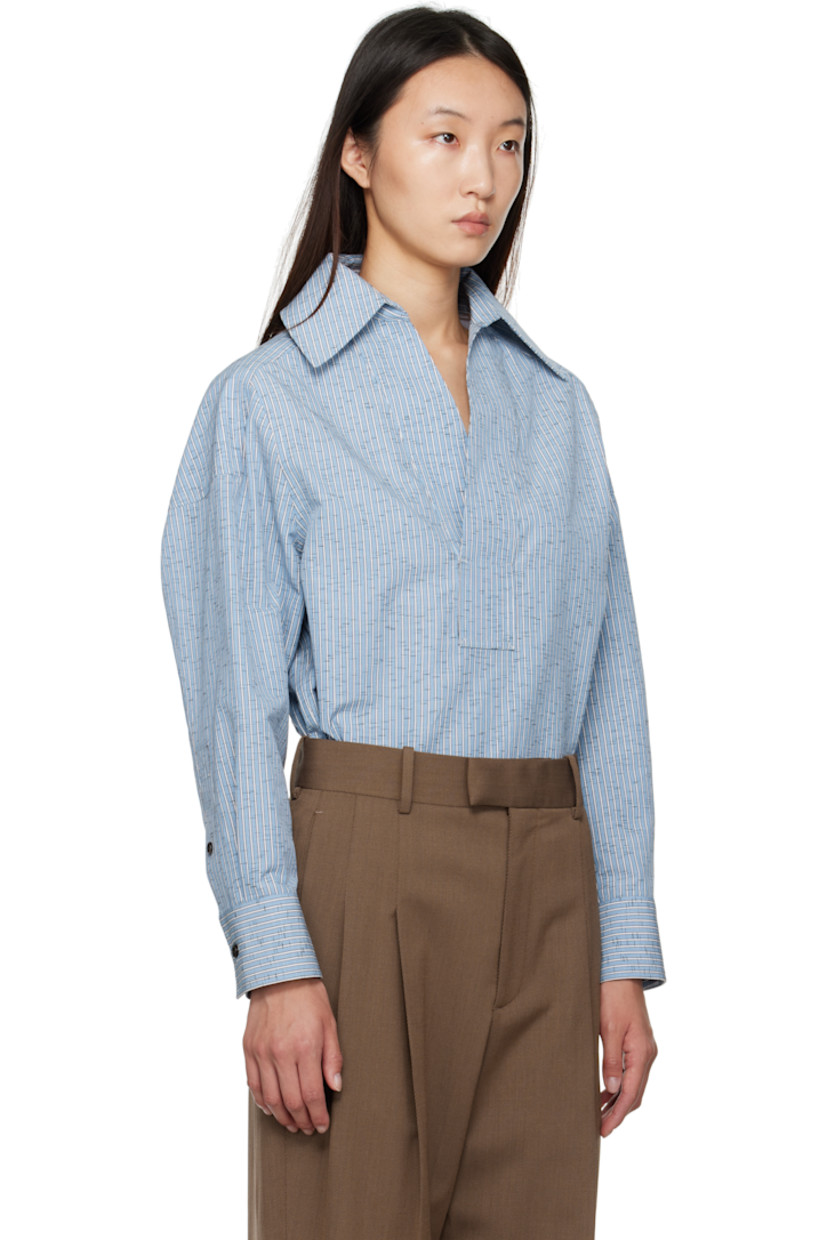 Cotton- and linen-blend dobby cloth shirt.

· Stripe pattern throughout
· Spread collar
· Open placket
· Shirttail hem
· Dropped shoulders
· Buttoned barrel cuffs
· Box pleat at back

Supplier color: Blue/White